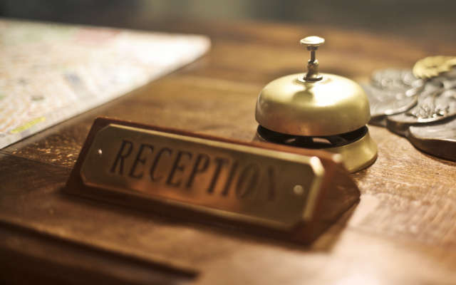 the reception desk at a hotel